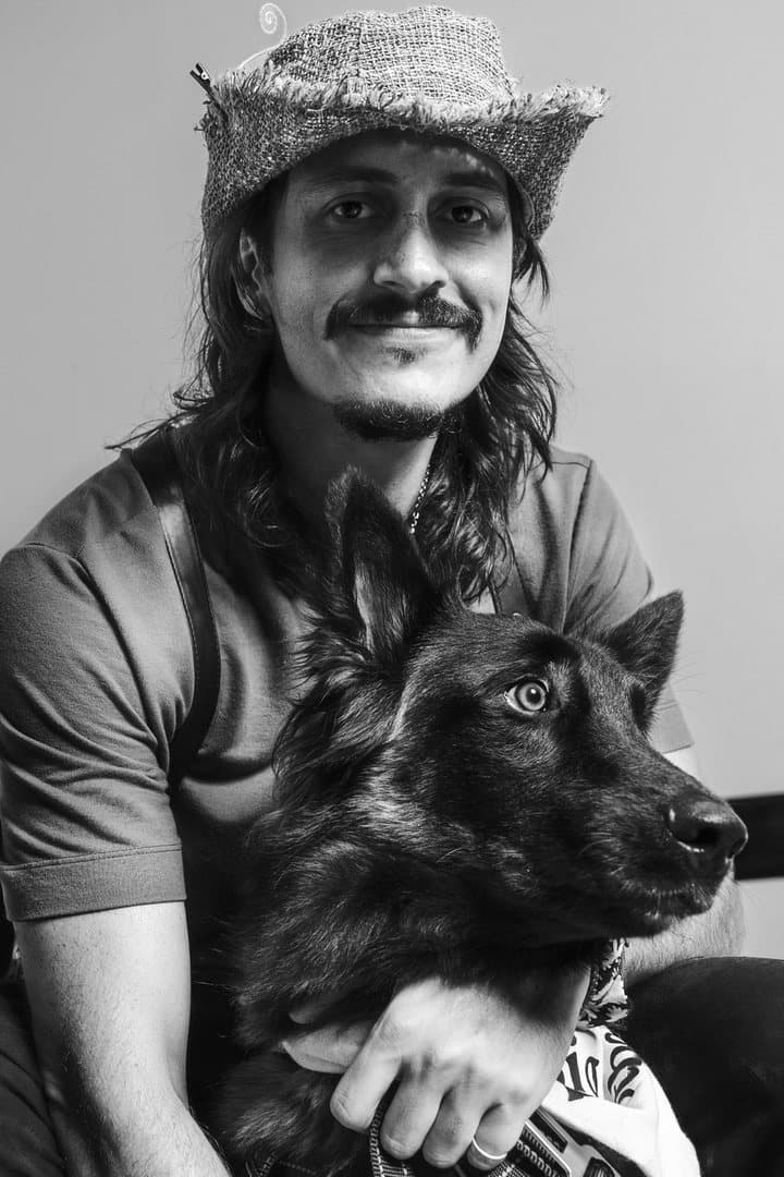 Camus, the dog behind the name, with Esteban.